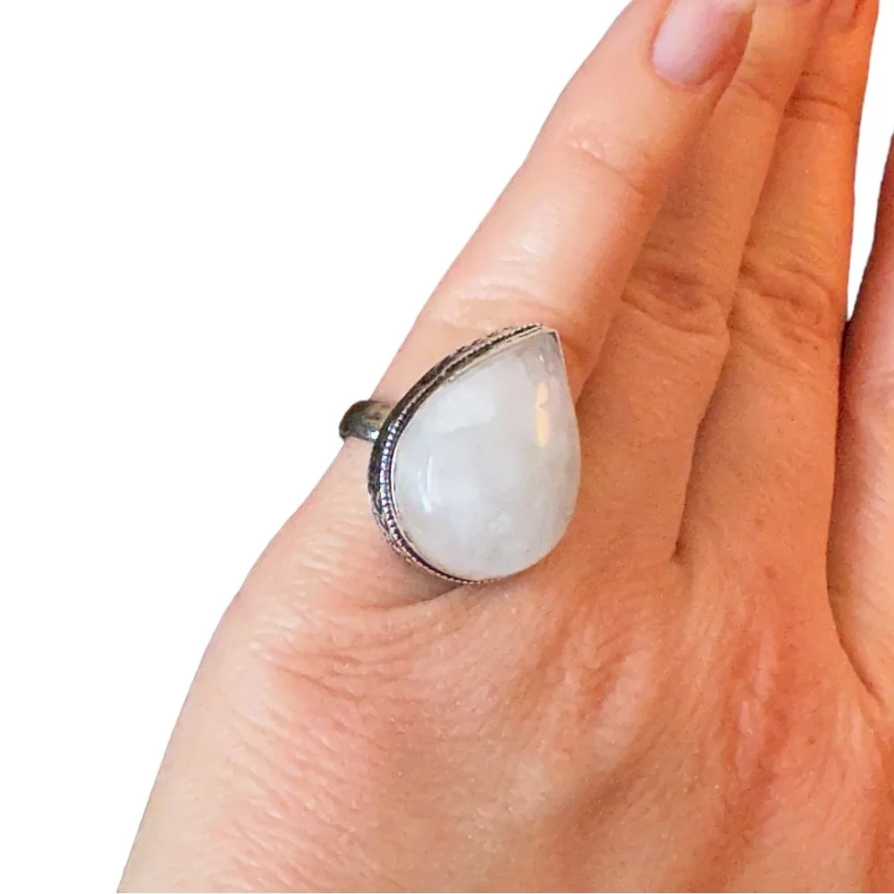 Milky white quartz teardrop stone in sterling silver setting size 6 925
